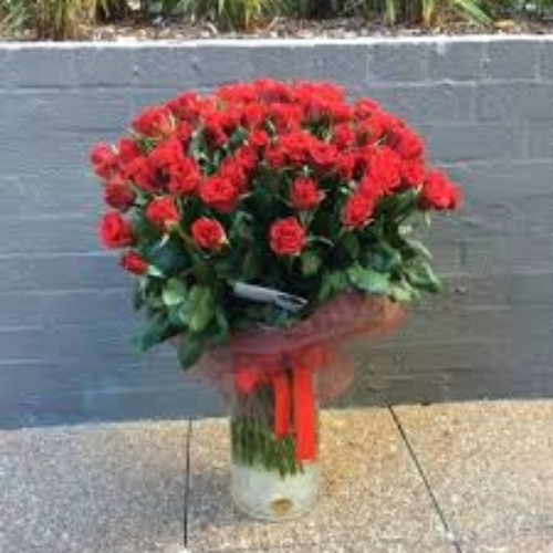 Allure, A large arrangement of 50 longstem red roses.