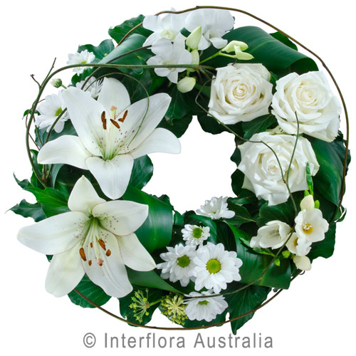 Comforting Embrace, Mixed Floral Wreath Suitable for Service.